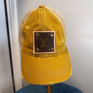 Upcycled LV patch CC distressed trucker mesh hat
